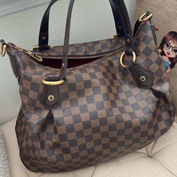 Louis Vuitton - Picture 2 of 16